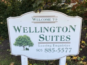 Wellington Suites - sign